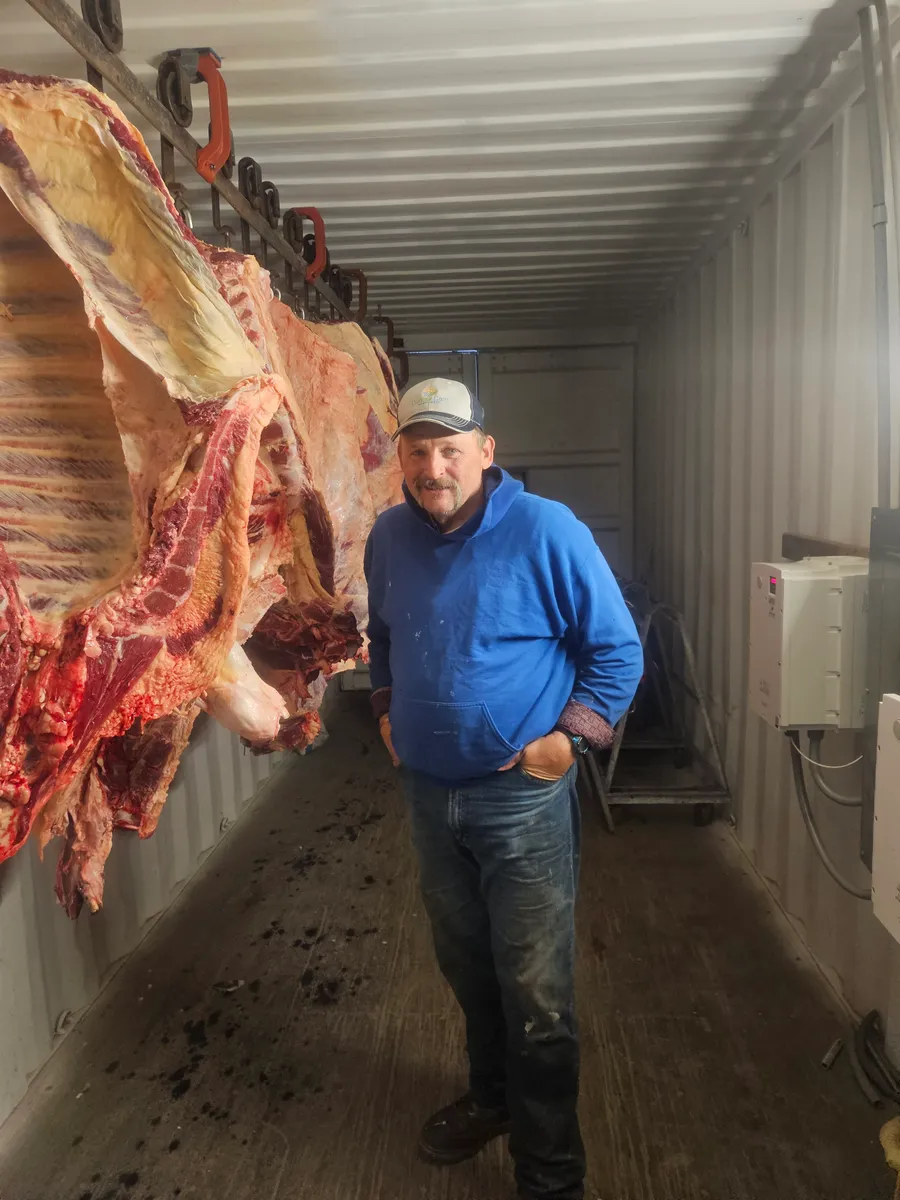 Howard Larson in the cooler at H&M Custom Meat in Creston WA